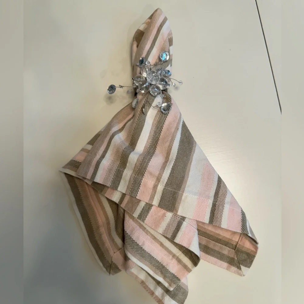 West Elm linen Pink/Taupe/White striped napkins or place settings.